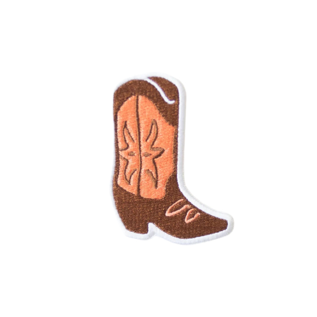 Cowboy boot patch with star design on a white background