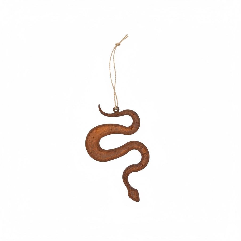 A brown metal snake ornament placed on a white background.