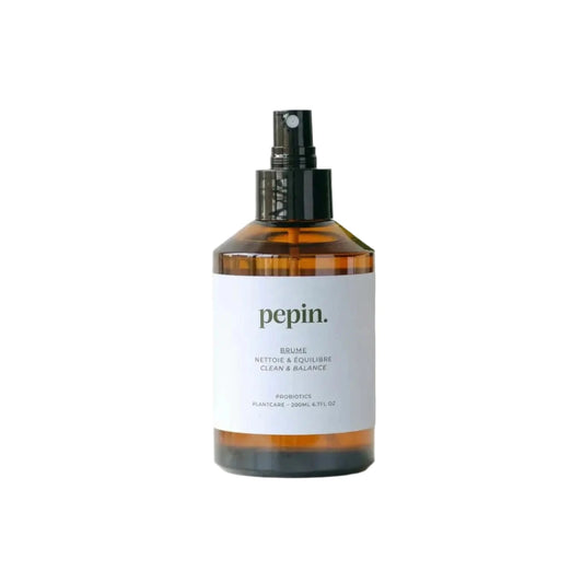 Brown spray bottle with 'pepin.' label on a white background.