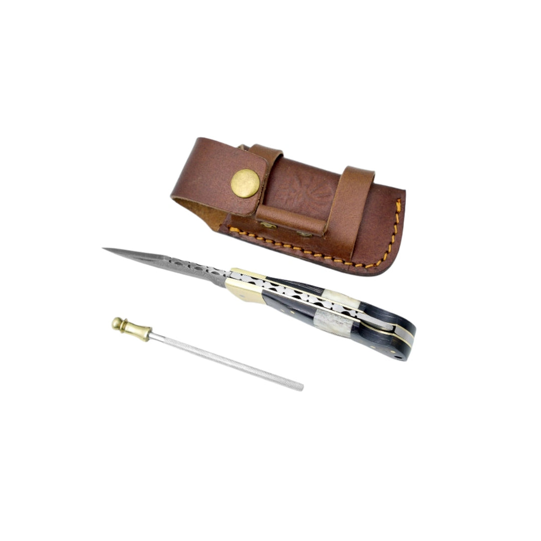 Pocket knife with leather case on a white background