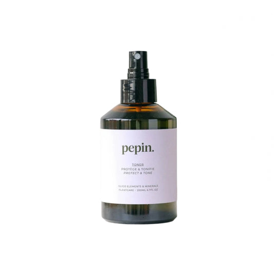 Bottle of 'pepin.' toner on a white  background